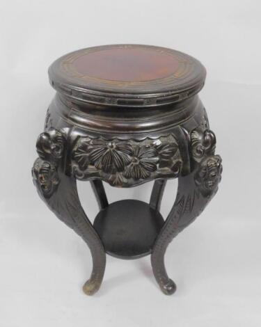 A Chinese late 19thC ebonised hardwood urn stand