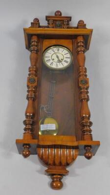 A late 19thC walnut and oak Vienna wall clock