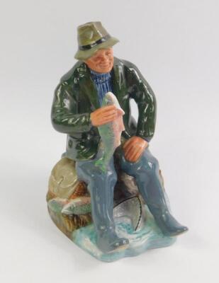 A Royal Doulton figure modelled as A Good Catch HN2258.