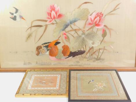 A Chinese silk picture of mandarin ducks and water lilies