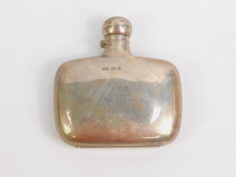 An Edward VII silver hip flask