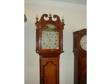 A George III oak and flamed mahogany veneered long case clock with swan neck pillared hood