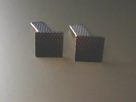 A pair of 9ct gold square head engine turned bar cuff links