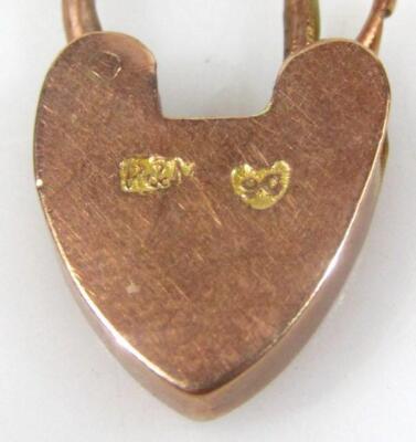 A 9ct gold fob pendant - 4