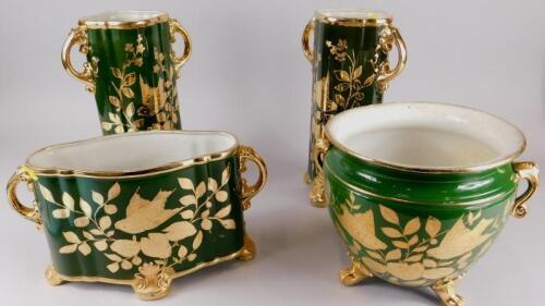 An early 20thC Staffordshire pottery garniture