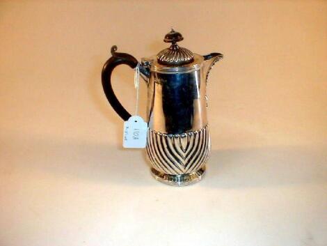 An Elkington & Co silver hot water jug with part reeded body