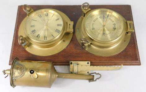 A replica ship's clock and barometer