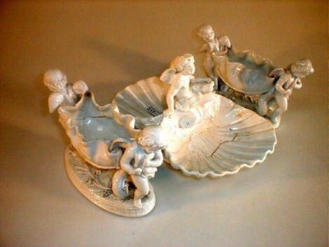 A 19thC white ground porcelain table centrepiece