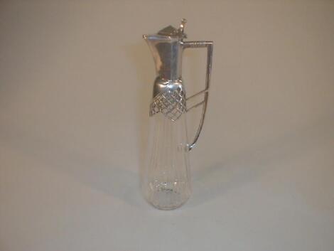 An early 20thC glass small flagon with electroplate mounts and handle