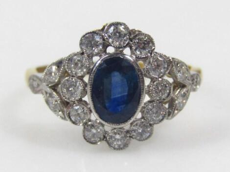 An 18ct gold sapphire and diamond ring