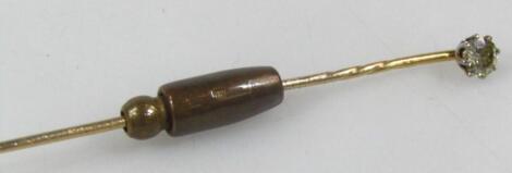 A diamond stick pin