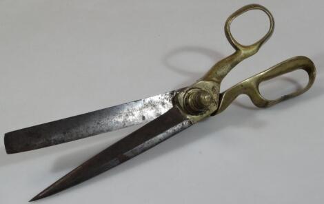 A pair of early 20thC brass handled tailor's scissors