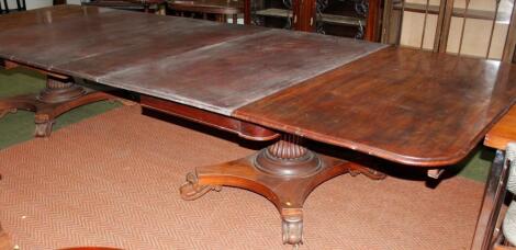 A William IV mahogany extending twin pillar dining table