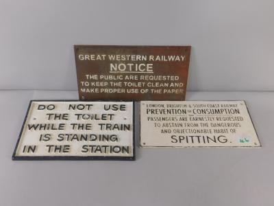 Various metal railway signs