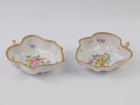 A pair of Dresden 20thC porcelain leaf shaped dishes