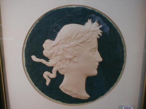 A late 19thC embossed profile portrait of a classical maiden wearing a ribbon wreath