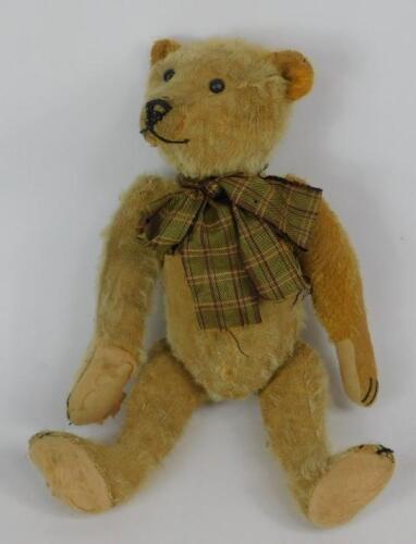 An early 20thC brown mohair hump back Teddy bear