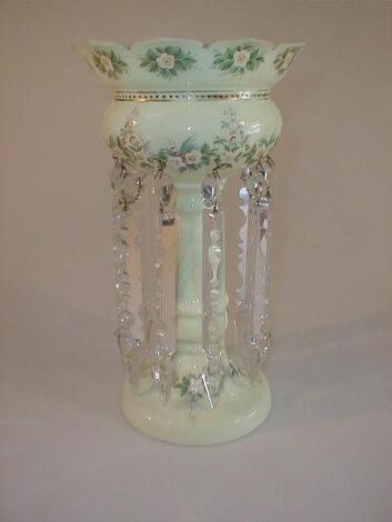 A Victorian milk glass table lustre with a petallated rim