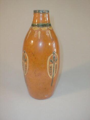 A terracotta ovoid vase