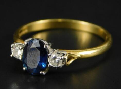 An 18ct gold sapphire and diamond dress ring