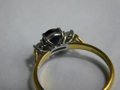 An 18ct gold sapphire and diamond dress ring - 3