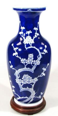 A late Qing period Chinese porcelain prunus vase