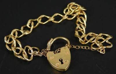 A 9ct gold charm bracelet