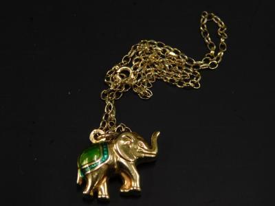 A 9ct gold elephant pendant and chain