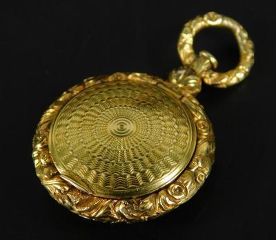 A gilt metal locket