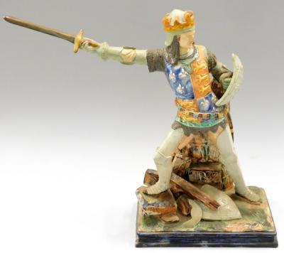 A late 19th/early 20thC majolica pottery figure of a king or knight