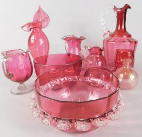 A collection of Victorian and later cranberry tinted glass