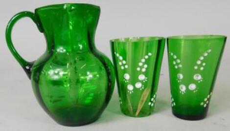 A Victorian green glass jug