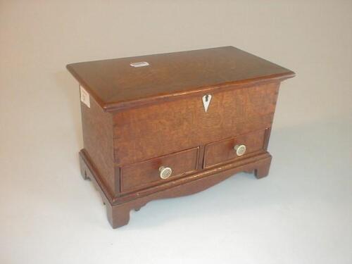 A miniature oak mule chest