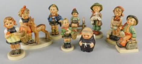 A collection of Hummel figures