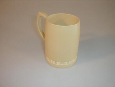 A Wedgwood one pint mug designed by Keith Murray