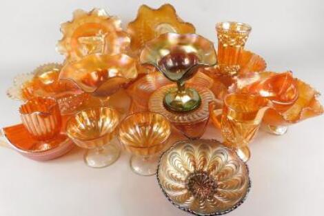 A large quantity of marigold coloured Carnival glass