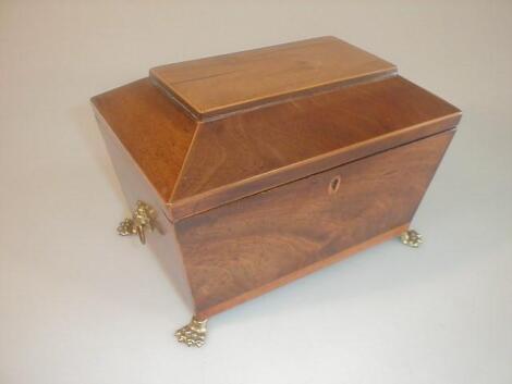 A Regency period figured Mahogany sarcophagus tea caddy