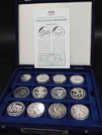 A collection of silver commemorative coins