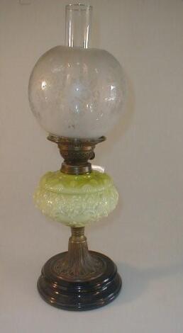 An early 20thC oil lamp with a double burner