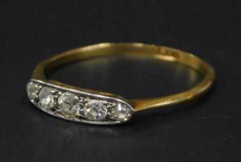 A five stone diamond dress ring