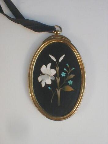 A Victorian pietra dura oval pendant plaque