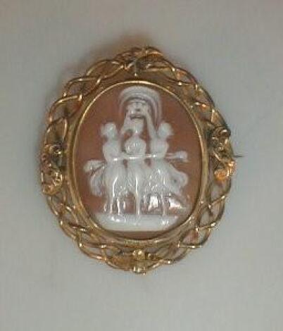 A carved cameo brooch with swivel panel