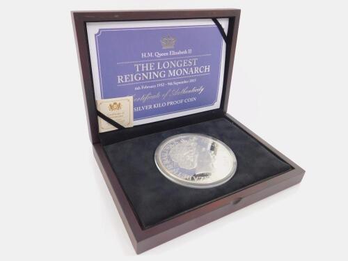 An Elizabeth II silver kilo proof £100 coin