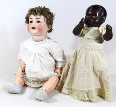 A very early 20thC Simon & Halbig bisque headed talking doll