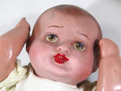 A very early 20thC Simon & Halbig bisque headed talking doll - 3