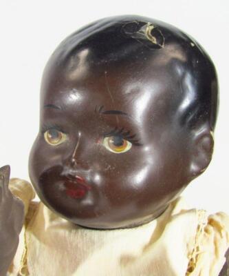 A very early 20thC Simon & Halbig bisque headed talking doll - 9