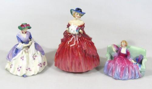 Three Royal Doulton figures of Genevieve