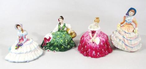 Four Royal Doulton figures