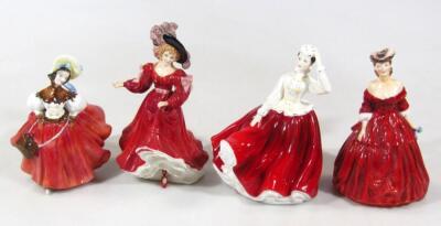 Four various Royal Doulton figures