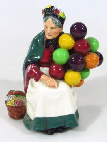 A Royal Doulton figure The Old Balloon Seller